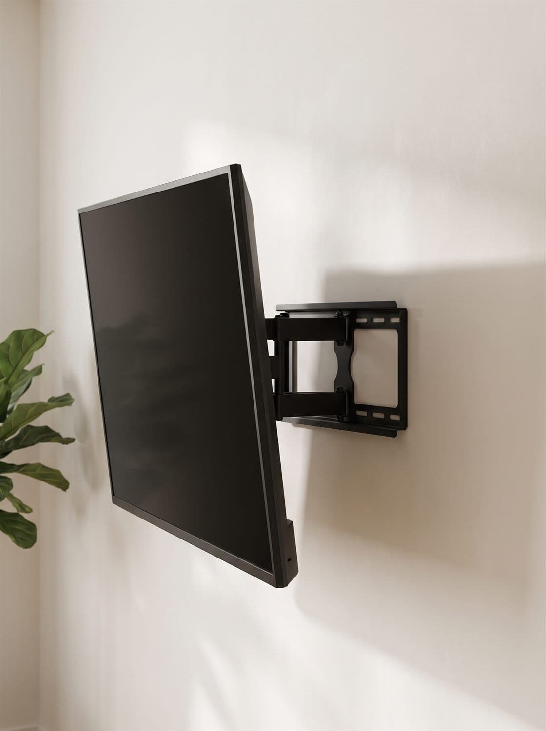 Tv op een draaibare wandbeugel, elegant van de muur gedraaid